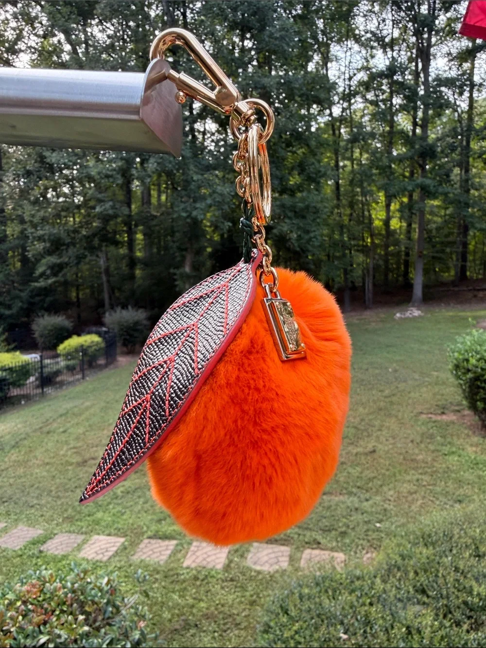 Dolce & Gabbana Orange  Mink Fur Pom-Pom Keychain with Black Leaf Accent